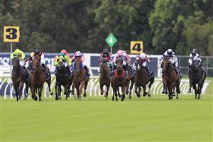 SYDNEY, AUSTRALIA - MARCH 12: Reece Jones on Invincible Kiss (pink/pale blue) wins race 1 the Midway Handicap during Sydney Racing Chandon Ladies Day at Rosehill Gardens on March 12, 2022 in Sydney, Australia. (Photo by Mark Evans/Getty Images)