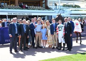 MELBOURNE, AUSTRALIA - MARCH 12: Damian Lane poses with winning connections after riding Let'srollthedice to win Race 4, MSS Security Sires' Produce Stakes, during Melbourne Racing at Flemington Racecourse on March 12, 2022 in Melbourne, Australia. (Getty)