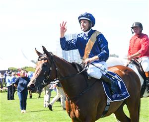 MELBOURNE, AUSTRALIA - MARCH 12: Hugh Bowman after winning Race 3, the Moomba Plate, during Melbourne Racing at Flemington Racecourse on March 12, 2022 in Melbourne, Australia. (Photo by Vince Caligiuri/Getty Images)