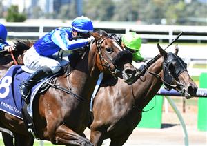 MELBOURNE, AUSTRALIA - MARCH 12: Jamie Kah riding Ruthless Dame winning Race 1, the Tbv Thoroughbred Breeders Stakes, during Melbourne Racing at Flemington Racecourse on March 12, 2022 in Melbourne, Australia. (Photo by Vince Caligiuri/Getty Images)