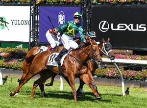 MELBOURNE, AUSTRALIA - MARCH 12: Patrick Moloney riding Roch 'N' Horse to win the Yulong Stud Newmarket Handicap, during Melbourne Racing at Flemington Racecourse on March 12, 2022 in Melbourne, Australia. (Photo by Vince Caligiuri/Getty Images)
