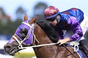 SYDNEY, AUSTRALIA - MARCH 12: Tommy Berry on Shelby Sixtysix wins race 5 the City Tattersalls Group Maurice McCarten Stakes during Sydney Racing Chandon Ladies Day at Rosehill Gardens on March 12, 2022 in Sydney, Australia. (Photo by Mark Evans/Getty Images)