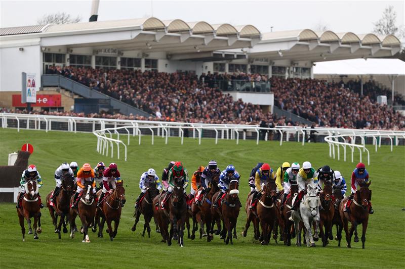 The field compete in the Ultima Handicap Chase on the first day of the Cheltenham Festival at Cheltenham Racecourse, in Cheltenham, England on March 15, 2022. (Photo by Adrian DENNIS / AFP) (Photo by ADRIAN DENNIS/AFP via Getty Images)