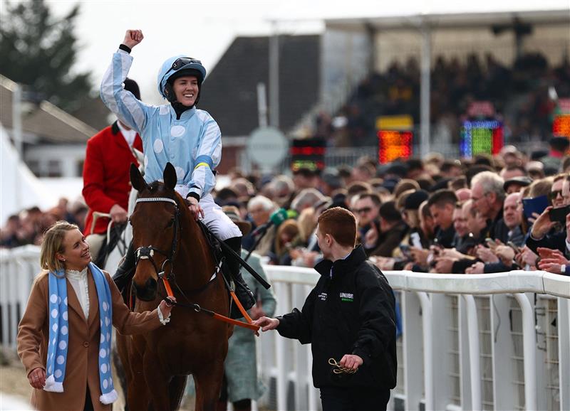 Jockey Rachael Blackmore reacts as she returns to the winner's enclosure after her victory on Honeysuckle in the Champion Hurdle on the first day of the Cheltenham Festival at Cheltenham Racecourse, in Cheltenham, England on March 15, 2022. (Photo by Adrian DENNIS / AFP) (Photo by ADRIAN DENNIS/AFP via Getty Images)