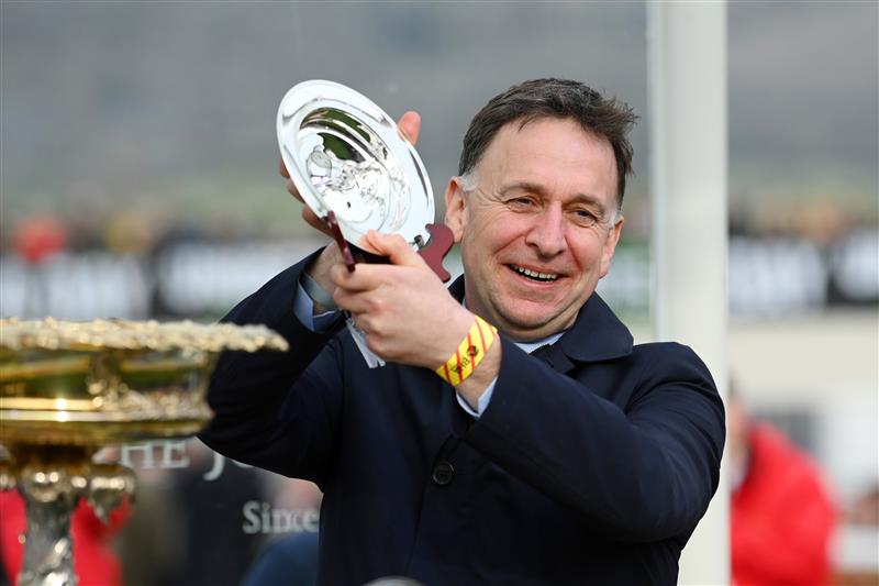 CHELTENHAM, ENGLAND - MARCH 15: Henry de Bromhead, trainer of Honeysuckle celebrate during the victory ceremony for the The Unibet Champion Hurdle race during day one of the Cheltenham Festival 2022 at Cheltenham Racecourse on March 15, 2022 in Cheltenham, England. (Photo by Mike Hewitt/Getty Images)