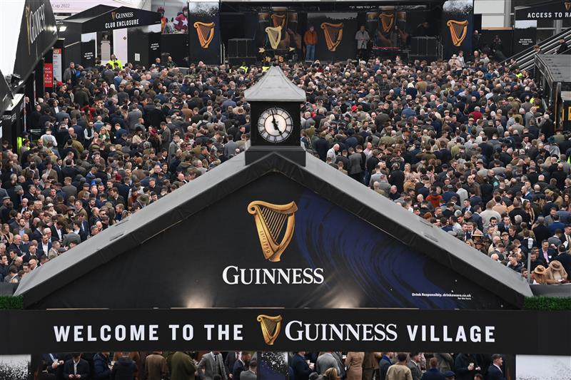 CHELTENHAM, ENGLAND - MARCH 15: A packed Guinness Village during the first day of The Festival at Cheltenham Racecourse on March 15, 2022 in Cheltenham, England. (Photo by Mike Hewitt/Getty Images)