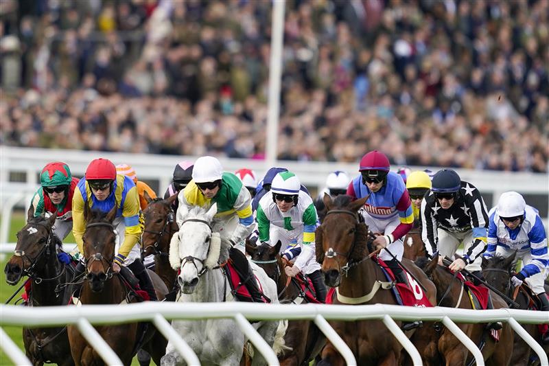 CHELTENHAM, ENGLAND - MARCH 15: A general view as runners turn away from the grandstand during The Ultima Handicap Chase on day one of The Festival at Cheltenham Racecourse on March 15, 2022 in Cheltenham, England. (Photo by Alan Crowhurst/Getty Images)