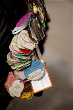 CHELTENHAM, ENGLAND - MARCH 15: A racegoer with badges from many days racing throughout the years on day one of The Festival at Cheltenham Racecourse on March 15, 2022 in Cheltenham, England. (Photo by Alan Crowhurst/Getty Images)