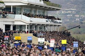 CHELTENHAM, ENGLAND - MARCH 15: A general view as racegoers watch on from the grandstands ahead of the Arkle Chase race during day one of the Cheltenham Festival 2022 at Cheltenham Racecourse on March 15, 2022 in Cheltenham, England. (Photo by Alan Crowhurst/Getty Images)