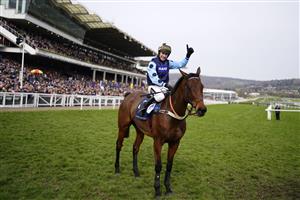 CHELTENHAM, ENGLAND - MARCH 15: Tom Cannon on Edwardstone celebrates victory after the Arkle Chase race during day one of the Cheltenham Festival 2022 at Cheltenham Racecourse on March 15, 2022 in Cheltenham, England. (Photo by Alan Crowhurst/Getty Images)