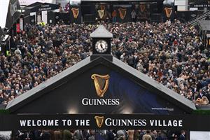 CHELTENHAM, ENGLAND - MARCH 15: A packed Guinness Village during the first day of The Festival at Cheltenham Racecourse on March 15, 2022 in Cheltenham, England. (Photo by Mike Hewitt/Getty Images)