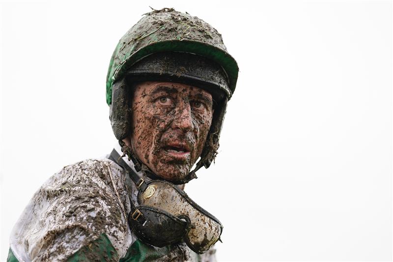 CHELTENHAM, ENGLAND - MARCH 16: A muddy Davy Russell on day two of The Festival at Cheltenham Racecourse on March 16, 2022 in Cheltenham, England. (Photo by Alan Crowhurst/Getty Images)