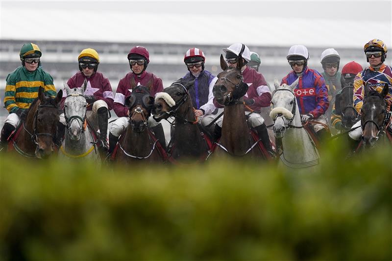 CHELTENHAM, ENGLAND - MARCH 16: Davy Russell riding Tiger Roll (3L, purple cap) during The Glenfarclas Chase on day two of The Festival at Cheltenham Racecourse on March 16, 2022 in Cheltenham, England. (Photo by Alan Crowhurst/Getty Images)