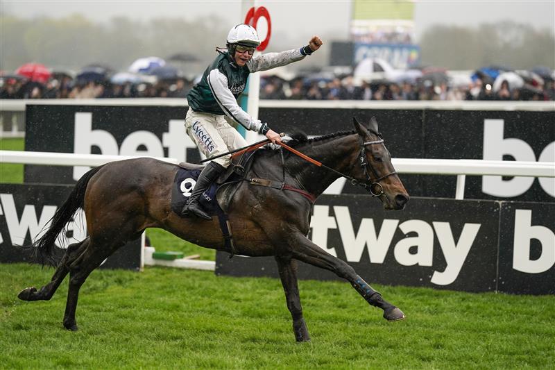 CHELTENHAM, ENGLAND - MARCH 16: Charlie Deutsch celebrates as he rides L'Homme Presse to victory in The Brown Advisory Novices' Chase on day two of The Festival at Cheltenham Racecourse on March 16, 2022 in Cheltenham, England. (Photo by Alan Crowhurst/Getty Images)