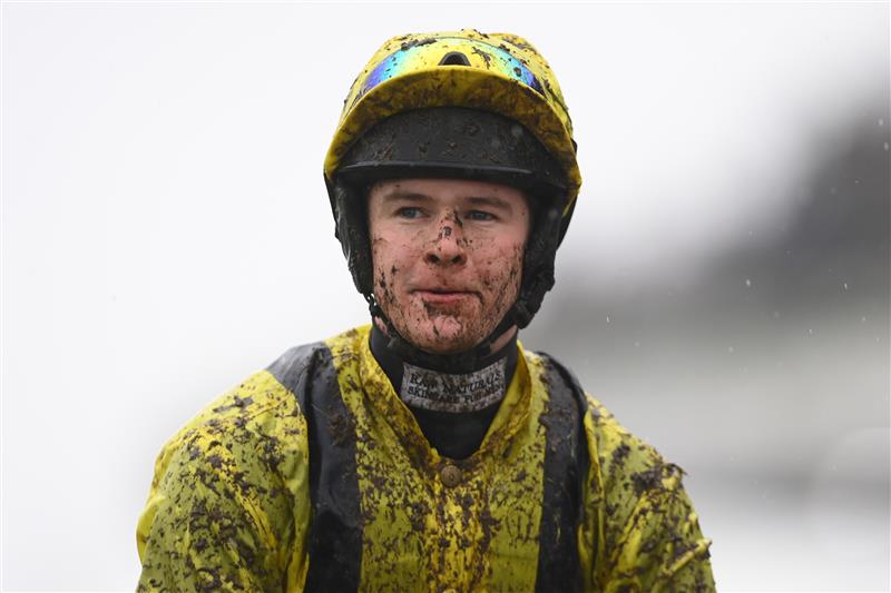 CHELTENHAM, ENGLAND - MARCH 16: A muddy Brendan Powell after the Ballymore Novices' Hurdle on day two of the Cheltenham Festival 2022 at Cheltenham Racecourse on March 16, 2022 in Cheltenham, England. (Photo by Mike Hewitt/Getty Images)