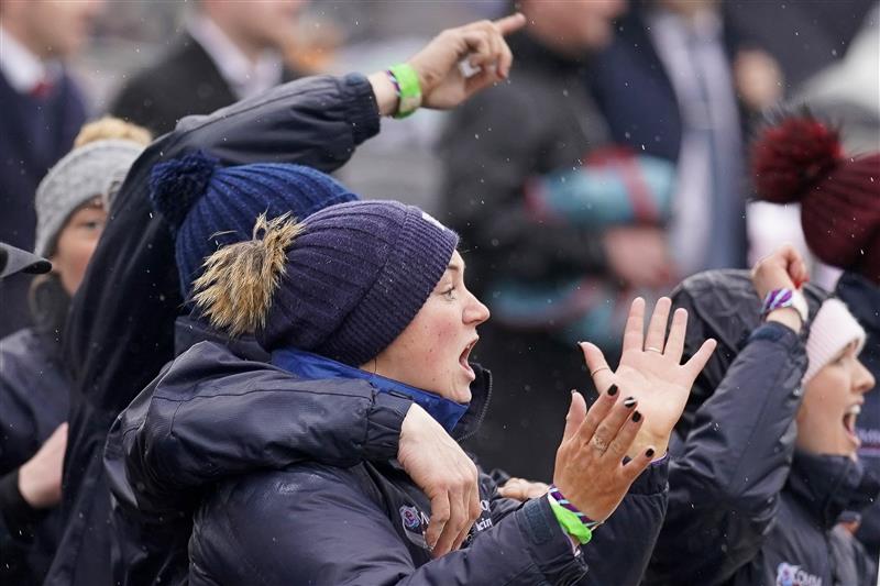CHELTENHAM, ENGLAND - MARCH 16: The Gordon Elliott grooms cheer on Delta work and Tiger Roll in The Glenfarclas Chase on day two of The Festival at Cheltenham Racecourse on March 16, 2022 in Cheltenham, England. (Photo by Alan Crowhurst/Getty Images)