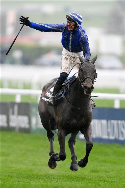CHELTENHAM, ENGLAND - MARCH 16: Paul Townend on Energumene celebrates after winning the Betway Queen Mother Champion Chase race during day two of Cheltenham Festival 2022 at Cheltenham Racecourse on March 16, 2022 in Cheltenham, England. (Photo by Mike Hewitt/Getty Images)
