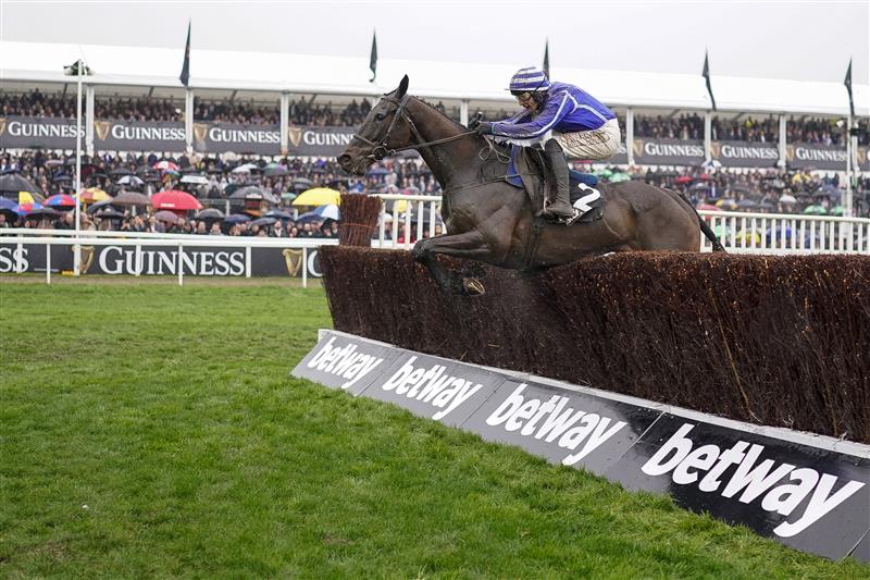 CHELTENHAM, ENGLAND - MARCH 16: Paul Townend riding Energumene clear the last to win The Betway Queen Mother Champion Chase on day two of The Festival at Cheltenham Racecourse on March 16, 2022 in Cheltenham, England. (Photo by Alan Crowhurst/Getty Images)