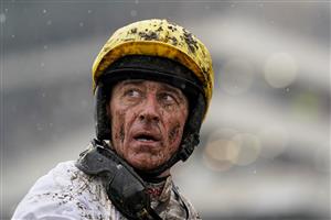 CHELTENHAM, ENGLAND - MARCH 16: A muddy Davy Russell on day two of The Festival at Cheltenham Racecourse on March 16, 2022 in Cheltenham, England. (Photo by Alan Crowhurst/Getty Images)