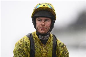 CHELTENHAM, ENGLAND - MARCH 16: A muddy Brendan Powell after the Ballymore Novices' Hurdle on day two of the Cheltenham Festival 2022 at Cheltenham Racecourse on March 16, 2022 in Cheltenham, England. (Photo by Mike Hewitt/Getty Images)