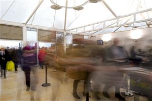CHELTENHAM, ENGLAND - MARCH 16: The doors open as racegoers make a dash through the entrance on day two of The Festival at Cheltenham Racecourse on March 16, 2022 in Cheltenham, England. (Photo by Alan Crowhurst/Getty Images)