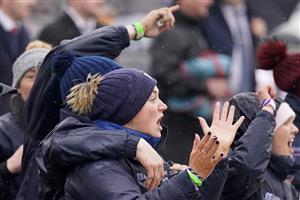 CHELTENHAM, ENGLAND - MARCH 16: The Gordon Elliott grooms cheer on Delta work and Tiger Roll in The Glenfarclas Chase on day two of The Festival at Cheltenham Racecourse on March 16, 2022 in Cheltenham, England. (Photo by Alan Crowhurst/Getty Images)