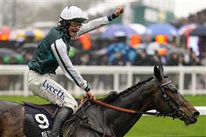 CHELTENHAM, ENGLAND - MARCH 16: Charlie Deutsch celebrates as he rides L'Homme Presse to victory in The Brown Advisory Novices' Chase on day two of The Festival at Cheltenham Racecourse on March 16, 2022 in Cheltenham, England. (Photo by Alan Crowhurst/Getty Images)