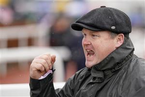 CHELTENHAM, ENGLAND - MARCH 16: A delighted Gordon Elliott after training Commander Of Fleet to win The Coral Cup Handicap Hurdle on day two of The Festival at Cheltenham Racecourse on March 16, 2022 in Cheltenham, England. (Photo by Alan Crowhurst/Getty Images)