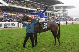 CHELTENHAM, ENGLAND - MARCH 16: Paul Townend on Energumene celebrates after winning the Betway Queen Mother Champion Chase race during day two of Cheltenham Festival 2022 at Cheltenham Racecourse on March 16, 2022 in Cheltenham, England. (Photo by Mike Hewitt/Getty Images)