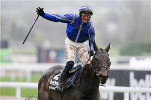 CHELTENHAM, ENGLAND - MARCH 16: Paul Townend on Energumene celebrates after winning the Betway Queen Mother Champion Chase race during day two of Cheltenham Festival 2022 at Cheltenham Racecourse on March 16, 2022 in Cheltenham, England. (Photo by Mike Hewitt/Getty Images)