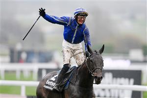 CHELTENHAM, ENGLAND - MARCH 16: Paul Townend on Energumene celebrates after winning the Betway Queen Mother Champion Chase race during day two of Cheltenham Festival 2022 at Cheltenham Racecourse on March 16, 2022 in Cheltenham, England. (Photo by Mike Hewitt/Getty Images)
