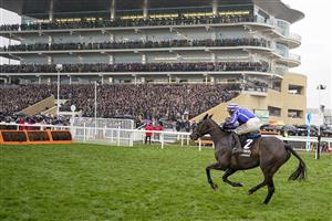 CHELTENHAM, ENGLAND - MARCH 16: Paul Townend riding Energumene clear the last to win The Betway Queen Mother Champion Chase on day two of The Festival at Cheltenham Racecourse on March 16, 2022 in Cheltenham, England. (Photo by Alan Crowhurst/Getty Images)