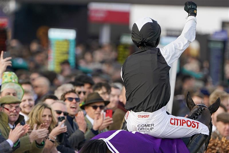 CHELTENHAM, ENGLAND - MARCH 17: Danny Mullins celebrates victory on Flooring Porter after winning The Paddy Power Stayers' Hurdle on day three of The Festival at Cheltenham Racecourse on March 17, 2022 in Cheltenham, England. (Photo by Alan Crowhurst/Getty Images)