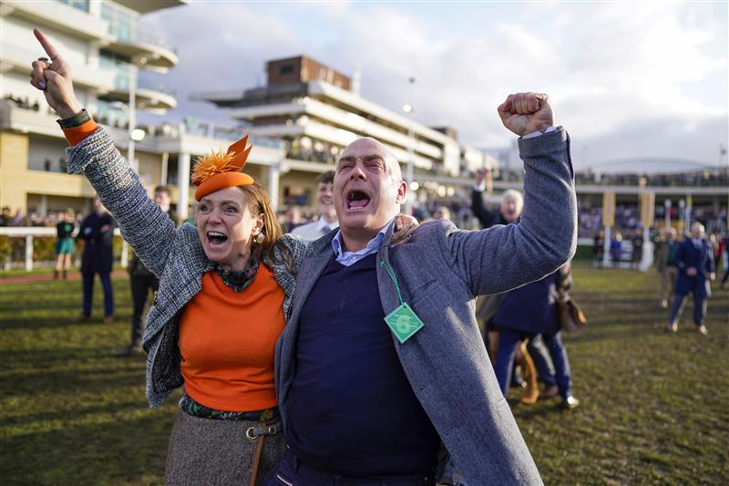CHELTENHAM, ENGLAND - MARCH 17: Reactions from the winning connections of Love Envoi as they watch their horse on the big screen win The Ryanair Mares' Novices' Hurdleon day three of The Festival at Cheltenham Racecourse on March 17, 2022 in Cheltenham, England. (Photo by Alan Crowhurst/Getty Images)
