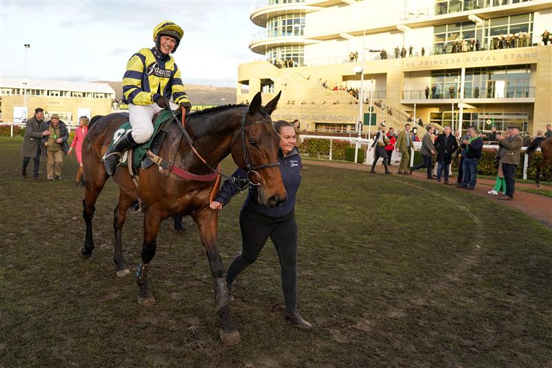 CHELTENHAM, ENGLAND - MARCH 17: Lucy Turner riding Chambardare led into the winners enclosure after victory in The Fulke Walwyn Kim Muir Challenge Cup Amateur Jockeys' Handicap Chase on day three of The Festival at Cheltenham Racecourse on March 17, 2022 in Cheltenham, England. (Photo by Alan Crowhurst/Getty Images)