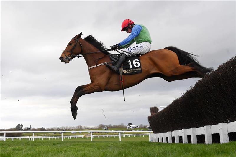 CHELTENHAM, ENGLAND - MARCH 17: Sean Flanagan on Born By The Sea clear the third last in The Craft Irish Whiskey Co. Plate Handicap Chase race during day three of The Cheltenham Festival 2022 at Cheltenham Racecourse on March 17, 2022 in Cheltenham, England. (Photo by Mike Hewitt/Getty Images)