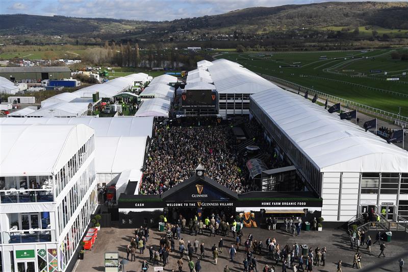 CHELTENHAM, ENGLAND - MARCH 17: The Guinness Village is packed on St Patrick's Day on day three of the Cheltenham Festival 2022 at Cheltenham Racecourse on March 17, 2022 in Cheltenham, England. (Photo by Mike Hewitt/Getty Images)