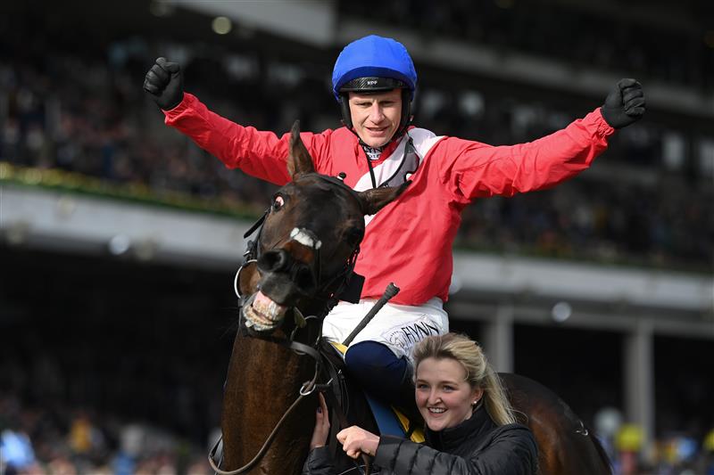 CHELTENHAM, ENGLAND - MARCH 17: Alaho and Paul Townend celebrate victory in the Ryanair Chase on day three of the Cheltenham Festival 2022 at Cheltenham Racecourse on March 17, 2022 in Cheltenham, England. (Photo by Mike Hewitt/Getty Images)
