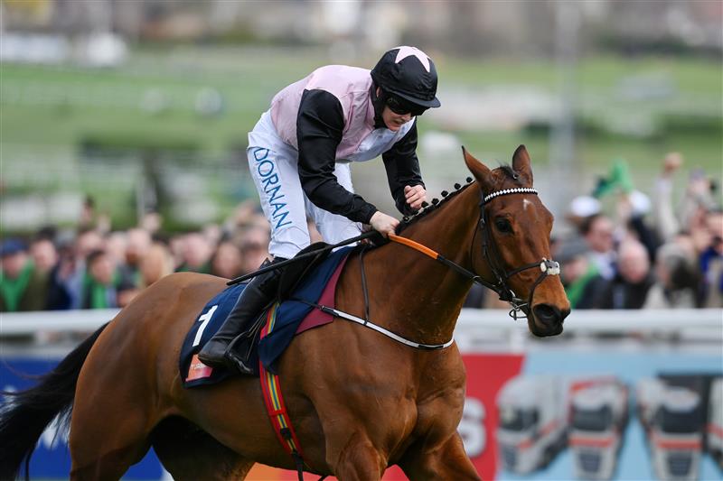 CHELTENHAM, ENGLAND - MARCH 17: Rachael Blackmore on Bob Olinger approach the finish line to win The Turners Novices’ Chase race during day three of The Cheltenham Festival 2022 at Cheltenham Racecourse on March 17, 2022 in Cheltenham, England. (Photo by Mike Hewitt/Getty Images)