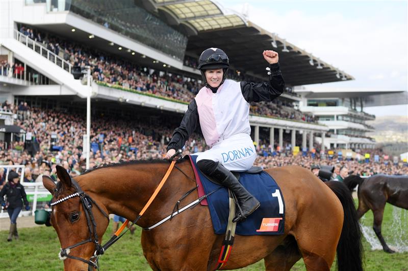 CHELTENHAM, ENGLAND - MARCH 17: Rachael Blackmore on Bob Olinger celebrates victory after The Turners Novices’ Chase race during day three of The Cheltenham Festival 2022 at Cheltenham Racecourse on March 17, 2022 in Cheltenham, England. (Photo by Mike Hewitt/Getty Images)