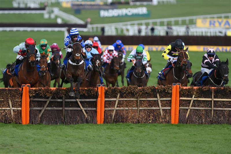 CHELTENHAM, ENGLAND - MARCH 17: Tom O'Brien (R, black and pink kit) on Third Wind clear the last to win The Pertemps Network Final Handicap Hurdle race during day three of The Cheltenham Festival 2022 at Cheltenham Racecourse on March 17, 2022 in Cheltenham, England. (Photo by Mike Hewitt/Getty Images)