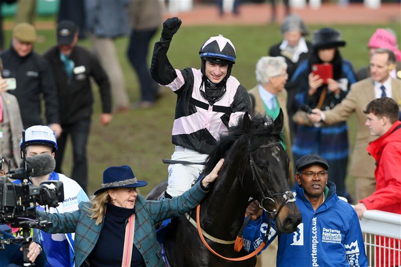 CHELTENHAM, ENGLAND - MARCH 17: Tom O'Brien (black and pink kit) on Third Wind celebrates victory in The Pertemps Network Final Handicap Hurdle race during day three of The Cheltenham Festival 2022 at Cheltenham Racecourse on March 17, 2022 in Cheltenham, England. (Photo by Mike Hewitt/Getty Images)