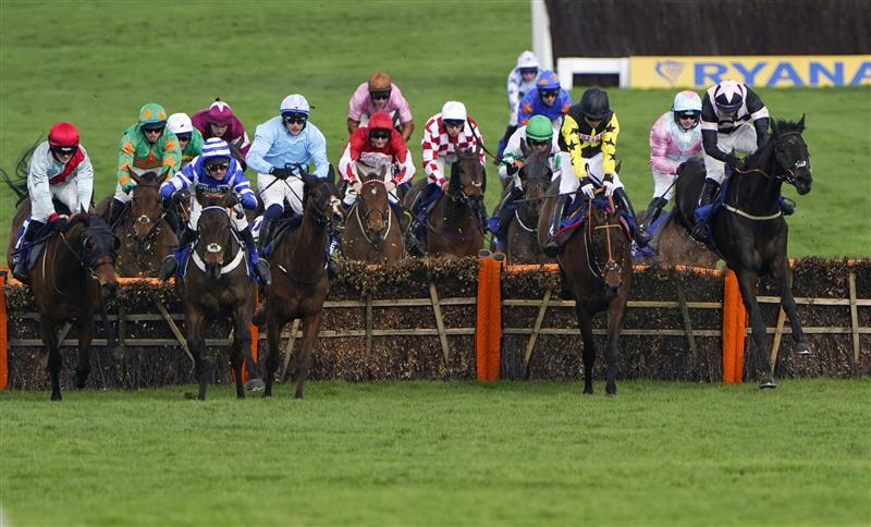 CHELTENHAM, ENGLAND - MARCH 17: Tom O'Brien (R, black and pink kit) on Third Wind clear the last to win The Pertemps Network Final Handicap Hurdle race during day three of The Cheltenham Festival 2022 at Cheltenham Racecourse on March 17, 2022 in Cheltenham, England. (Photo by Alan Crowhurst/Getty Images)