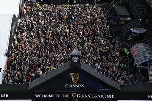 CHELTENHAM, ENGLAND - MARCH 17: The Guinness Village is packed on St Patrick's Day on day three of the Cheltenham Festival 2022 at Cheltenham Racecourse on March 17, 2022 in Cheltenham, England. (Photo by Mike Hewitt/Getty Images)