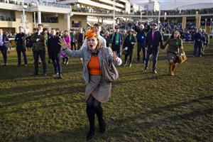 CHELTENHAM, ENGLAND - MARCH 17: Reactions from the winning connections of Love Envoi as they watch their horse on the big screen win The Ryanair Mares' Novices' Hurdleon day three of The Festival at Cheltenham Racecourse on March 17, 2022 in Cheltenham, England. (Photo by Alan Crowhurst/Getty Images)