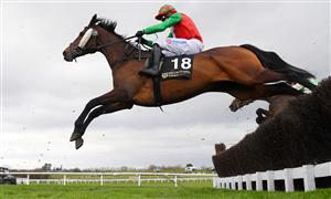 CHELTENHAM, ENGLAND - MARCH 17: Harry Skelton on Spiritofthegames clear the third last in The Craft Irish Whiskey Co. Plate Handicap Chase race during day three of The Cheltenham Festival 2022 at Cheltenham Racecourse on March 17, 2022 in Cheltenham, England. (Photo by Mike Hewitt/Getty Images)