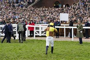 CHELTENHAM, ENGLAND - MARCH 17: Paul Townend leaves the track after parting ways with Galopin Des Champs over the last in The Turners Novices’ Chase race during day three of The Cheltenham Festival 2022 at Cheltenham Racecourse on March 17, 2022 in Cheltenham, England. (Photo by Alan Crowhurst/Getty Images)