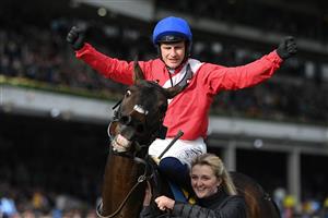 CHELTENHAM, ENGLAND - MARCH 17: Alaho and Paul Townend celebrate victory in the Ryanair Chase on day three of the Cheltenham Festival 2022 at Cheltenham Racecourse on March 17, 2022 in Cheltenham, England. (Photo by Mike Hewitt/Getty Images)