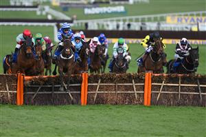 CHELTENHAM, ENGLAND - MARCH 17: Tom O'Brien (R, black and pink kit) on Third Wind clear the last to win The Pertemps Network Final Handicap Hurdle race during day three of The Cheltenham Festival 2022 at Cheltenham Racecourse on March 17, 2022 in Cheltenham, England. (Photo by Mike Hewitt/Getty Images)