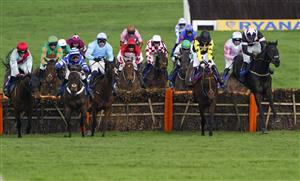 CHELTENHAM, ENGLAND - MARCH 17: Tom O'Brien (R, black and pink kit) on Third Wind clear the last to win The Pertemps Network Final Handicap Hurdle race during day three of The Cheltenham Festival 2022 at Cheltenham Racecourse on March 17, 2022 in Cheltenham, England. (Photo by Alan Crowhurst/Getty Images)